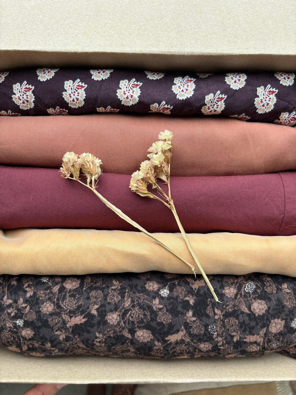 Parelpakket “floral earth” maat 40