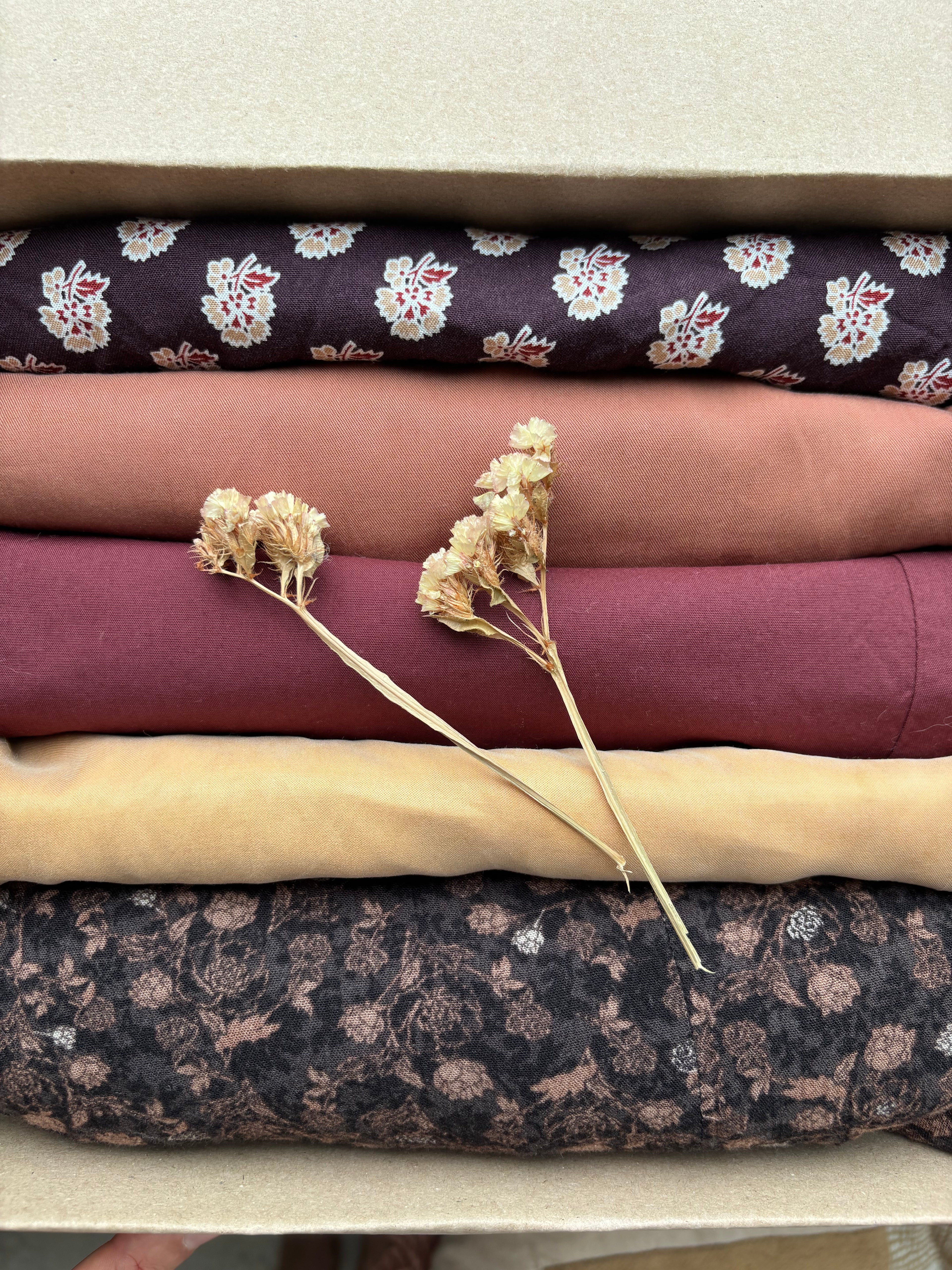 Parelpakket “floral earth” maat 40